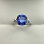 Engagement Ring - Platinum Brilliant Cut Untreated Blue Sapphires with Natural White Sapphires