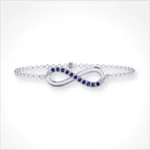Infinity Bracelet in 10K White Gold with Natural Blue Sapphires